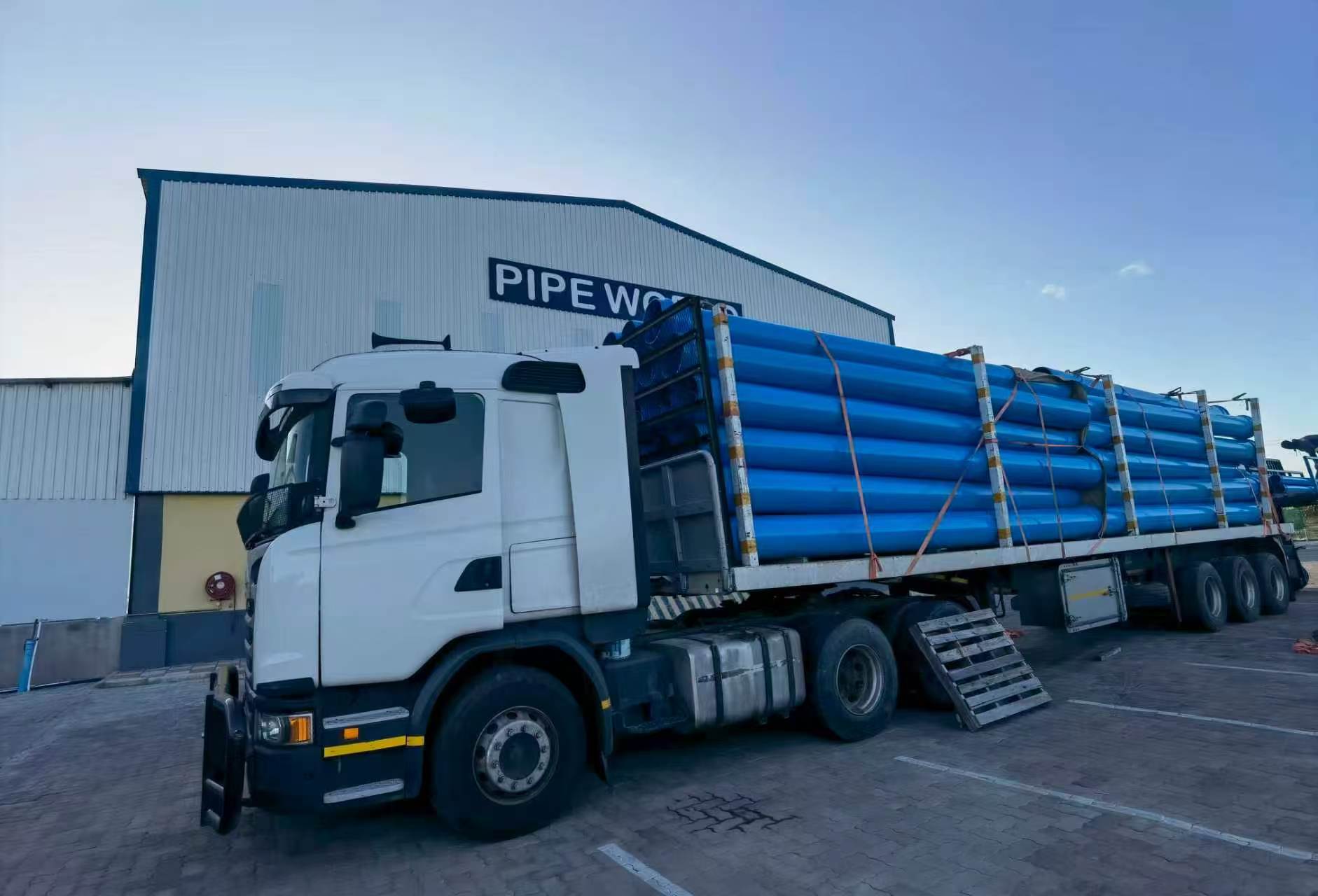 Pipe World truck loaded with pipes at the distribution yard